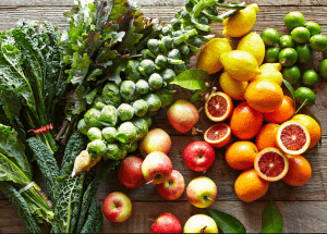 a group of fruits and vegetables on a wood surface Healthy Weight Loss Diets Hamilton